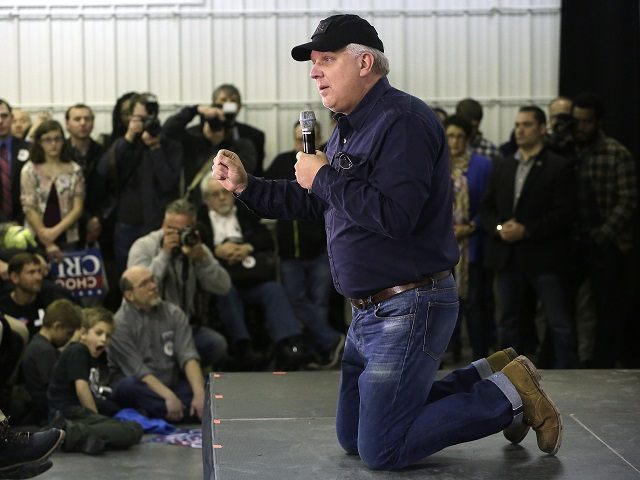 IOWA CITY, IA - JANUARY 31 : American television personality and radio host Glenn Beck talks from his knees about Republican presidential candidate Ted Cruz during a campaign event at the Johnson County Fairgrounds January 31, 2016 inIowa City, Iowa. Cruz is campaigning across the state on the eve of …