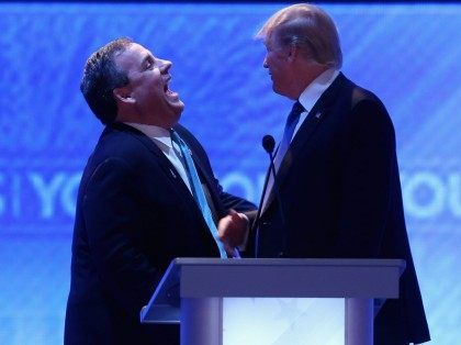 MANCHESTER, NH - FEBRUARY 06: Republican presidential candidates New Jersey Governor Chris Christie (L) and Donald Trump share a laugh during a commercial break in the Republican presidential debate at St. Anselm College February 6, 2016 in Manchester, New Hampshire. Sponsored by ABC News and the Independent Journal Review, this …