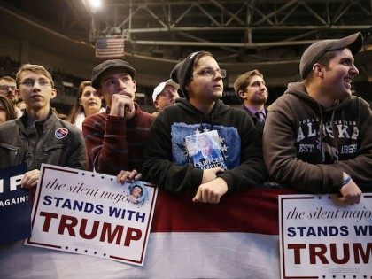 MANCHESTER, NH - FEBRUARY 08: People listen as Republican presidential candidate Donald T