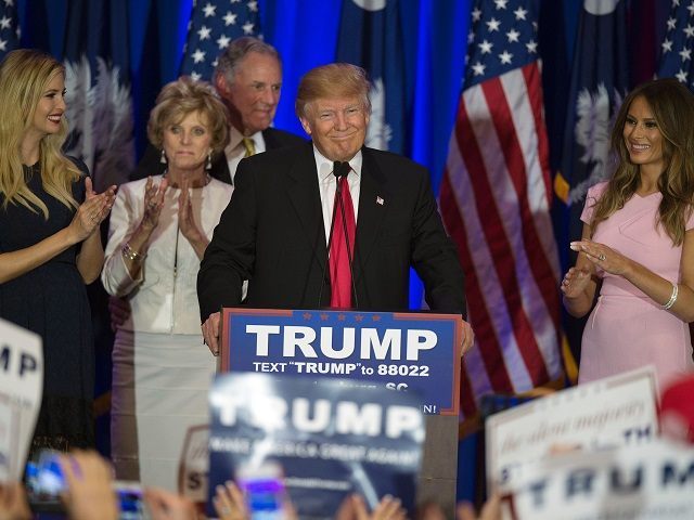 TOPSHOT - Republican presidential candidate Donald Trump celebrates winning the South Caro