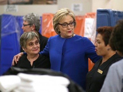 Democratic presidential candidate former Secretary of State Hillary Clinton (C) meets with service workers at Caesars Palace Las Vegas Hotel and Casino on February 18, 2016 in Las Vegas, Nevada.