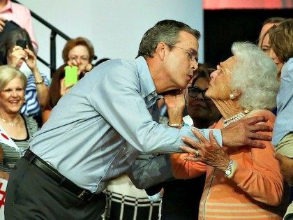 MIAMI, FL - JUNE 15: Former Florida Governor Jeb Bush kisses his mother Barbara Bush as h