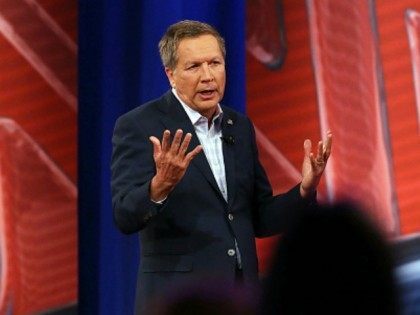 COLUMBIA, SC - FEBRUARY 18: Republican presidential candidate Gov. John Kasich answers a voter's question in a CNN South Carolina Republican Presidential Town Hall with host Anderson Cooper on February 18, 2016 in Columbia, South Carolina. The primary vote in South Carolina is February 20. (Photo by