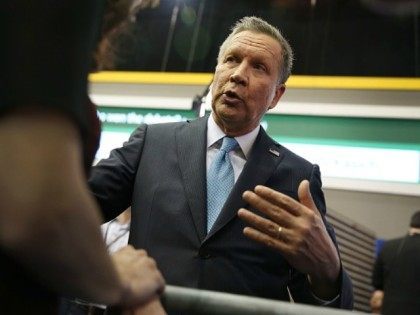Republican presidential candidate Ohio Gov. John Kasich speaks to the media in the spin room at the Republican National Committee Presidential Primary Debate at the University of Houston's Moores School of Music Opera House on February 25, 2016 in Houston, Texas.