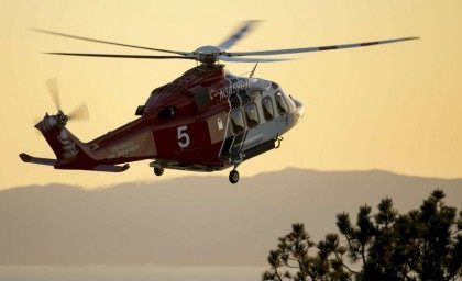LAFD helicopter (Damian Dovarganes / Associated Press)