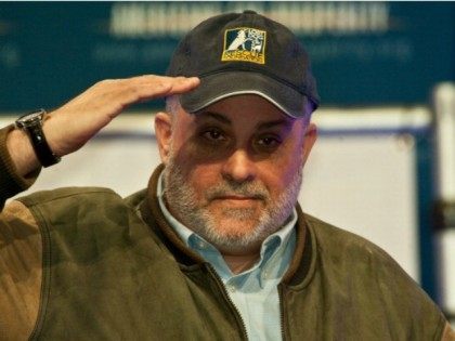 Mark Levin acknowledges the crowd after speaking at a 'Cut Spending Now' rally a