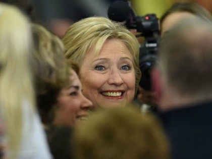 Democratic presidential hopeful Hillary Clinton greets the crowd at her primary night party February 9, 2016 at Southern New Hampshire University in Hooksett, New Hampshire.