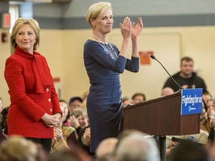 NORTH LIBERTY, IOWA - JANUARY 24: Cecile Richards (R) introduces Democratic presidential candidate Hillary Clinton at a campaign event with (2nd R), president of Planned Parenthood, at Buford Garner Elementary School on January 24, 2016 in North Liberty, Iowa.