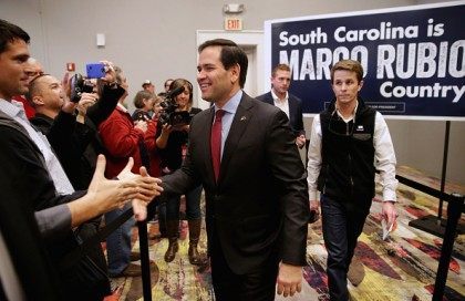 MYRTLE BEACH, SC - FEBRUARY 11: Republican presidential candidate Sen. Marco Rubio (R-FL) shakes hands as he arrives for a campaign town hall meeting at the Crown Reef Beach Resort February 11, 2016 in Myrtle Beach, South Carolina.)