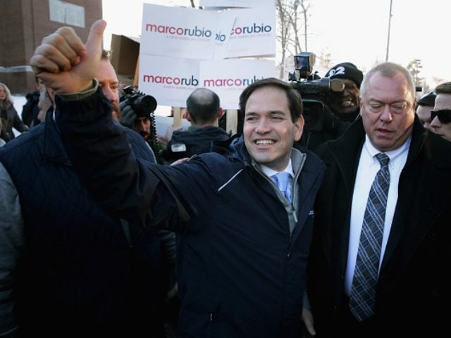 Volunteers and staff for Republican presidential candidate Sen. Marco Rubio (R-FL) and tra