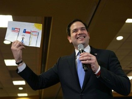 U.S. Sen. Marco Rubio (R-FL) holds up a drawing on February 24, 2016 in Houston, Texas.