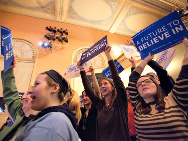 Supporters of Democratic presidential candidate Sen. Bernie Sanders (I-VT) cheer as Sander