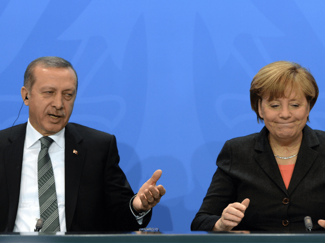 Turkey's Prime Minister Recep Tayyip Erdogan and German Chancellor Angela Merkel