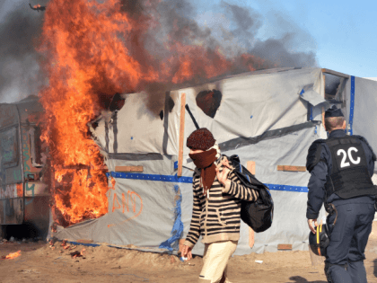 Calais migrant fire riot