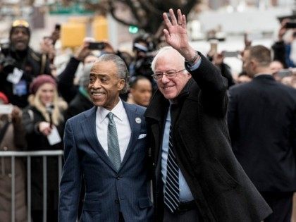 Democratic presidential candidate Sen. Bernie Sanders (D-VT) meets with Reverend Al Sharpt