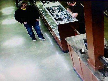 In this Saturday, Feb. 20, 2016 photo provided by Southwick’s gun store, Jason Dalton, left, appears in the store in Plainwell, Mich., hours before he went on a shooting rampage. Dalton admitted to gunning down randomly chosen victims in and around Kalamazoo, Mich., — attacks apparently carried out over hours …