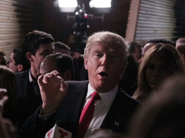 Presidential candidate Donald Trump speaks in the 'Spin Room' following the Repu