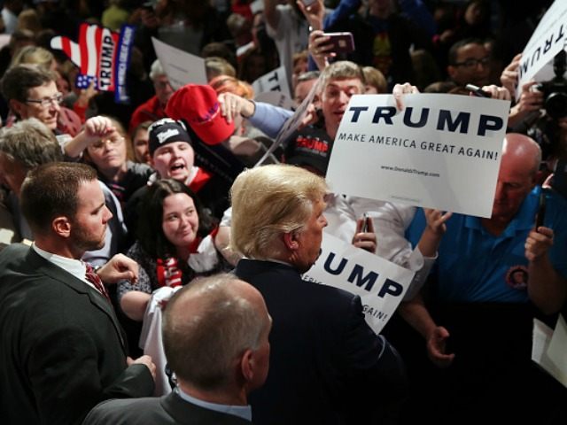 Donald Trump signs autographs after speaking on February 17, 2016 in Sumter, South Carolina.