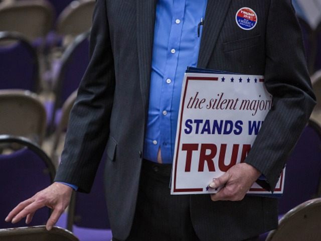 WATERLOO, IA - FEBRUARY 1: An audience member carries a sign following a campaign rally wi