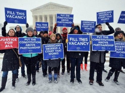 WASHINGTON, DC - FEBRUARY 15: People For the American Way activists rally outside of the Supreme Court, calling on Congress to give fair consideration to President Obama's nominee to the Supreme Court of the United States on February 15, 2016 in Washington, DC. (Photo by Larry French/Getty Images for People …