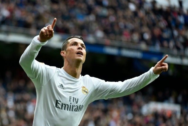 Real Madrid's forward Cristiano Ronaldo celebrates after scoring during the Spanish league