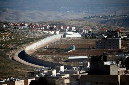A section of Israel's separation barrier in east Jerusalem divides the Palestinian Shuafat