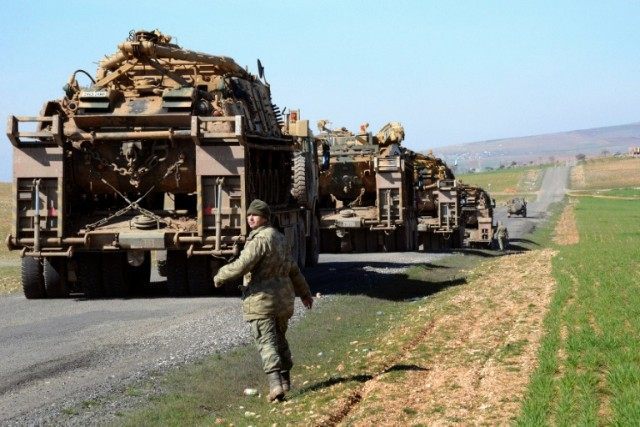 Turkish army vehicles are pictured near the Syrian border in Suruc in February 2015