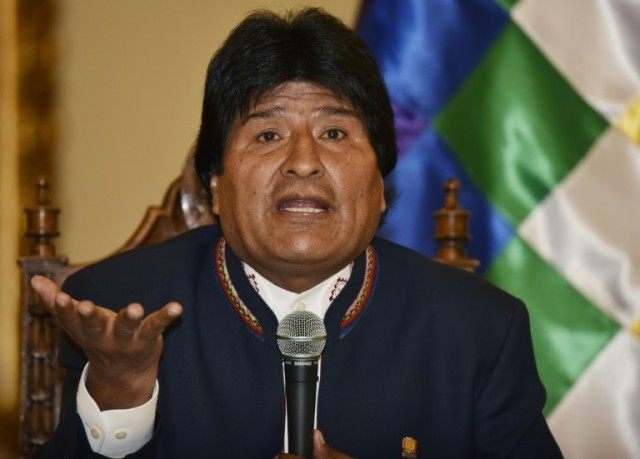 Bolivian President Evo Morales Ayma answers questions from the press at Quemado palace in