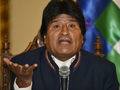 Bolivian President Evo Morales Ayma answers questions from the press at Quemado palace in La Paz on February 24, 2016