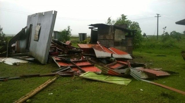 Damaged buildings at an undisclosed location on Fiji, after the most powerful cyclone in t