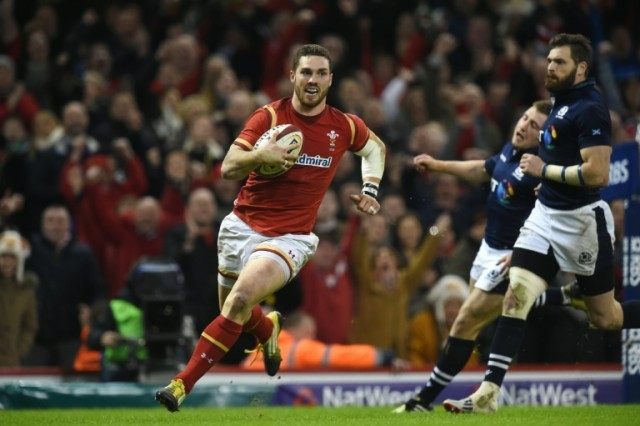 Wales wing George North runs in to score a try during the Six Nations international rugby