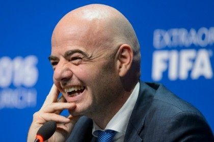 New FIFA president Gianni Infantino laughs during his first press conference following his