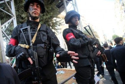 Hezbollah security forces stand guard during a rally marking Ashura in Beirut on October 2