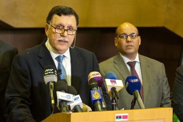 Libya's Prime Minister-designate Fayez al-Sarraj (L), seen on February 15, 2016 in the Mor