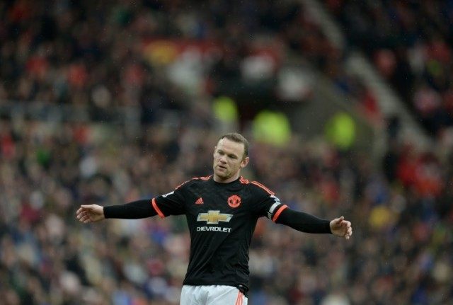 Manchester United's striker Wayne Rooney reacts during the English Premier League match ag