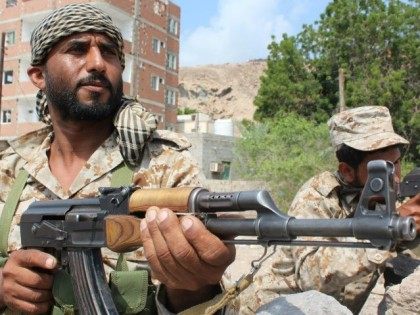 Security forces loyal to Yemen's president man a checkpoint in the southern city of Aden o