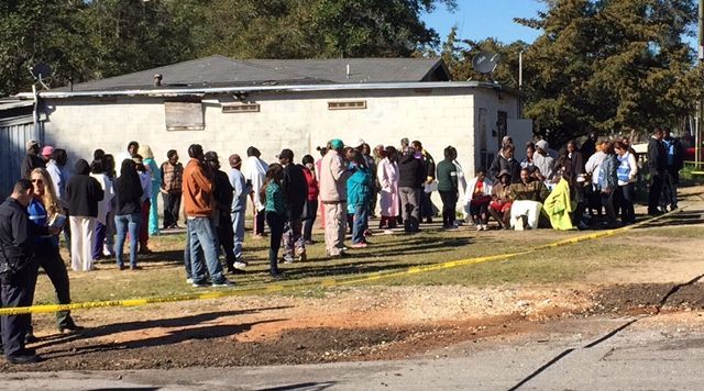 Dozens gather at scene of fatal house fire that claimed the lives of four Florida children. (Photo: Breitbart Texas/Rob Milford)
