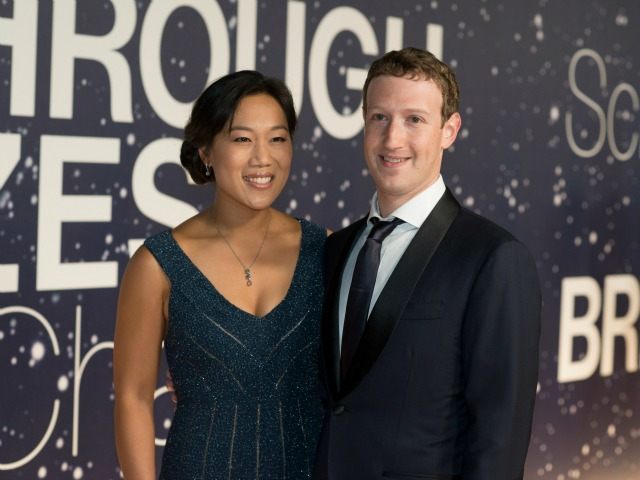 In this Nov. 9, 2014 file photo, Priscilla Chan and Mark Zuckerberg arrive at the 2nd Annu