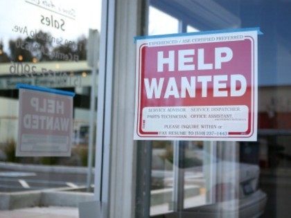 Help Wanted' sign is posted in the window of an automotive service shop on March 8, 2013 in El Cerrito, California.