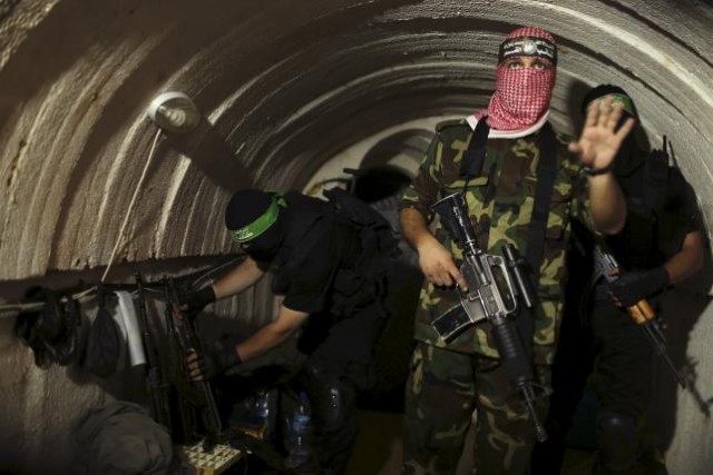 Palestinian fighter from the Izz el-Deen al-Qassam Brigades, the armed wing of the Hamas movement, 