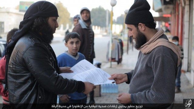 IS militants handed out leaflets in the Syrian city of Raqqa instructing the public about