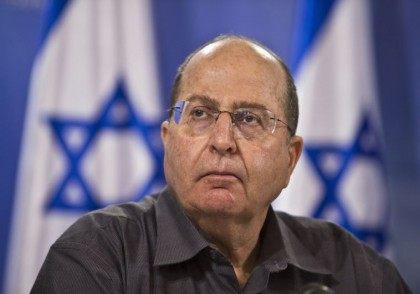 Defense Minister Moshe Ya'alon attends a news conference in Tel Aviv.