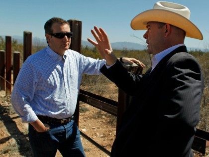 Arizona House Speaker David Gowan, right, speaks with Republican presidential candidate Sen. Ted Cruz, R-Texas, during a visit to the Arizona south border with Mexico in Douglas, Ariz., Friday, March 18, 2016.