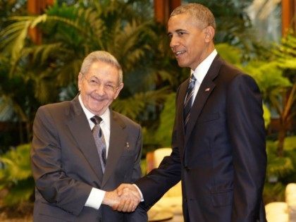 Cuban President Raul Castro, left, shakes hands with U.S. President Barack Obama during a