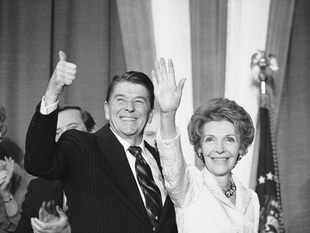 President Ronald and first lady Nancy Reagan give farewell waves following a fundraiser fo