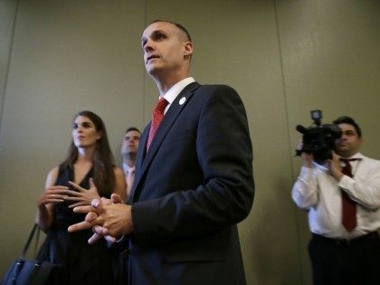 Lewandowski, center, looks on as Republican presidential candidate Donald Trump speaks at