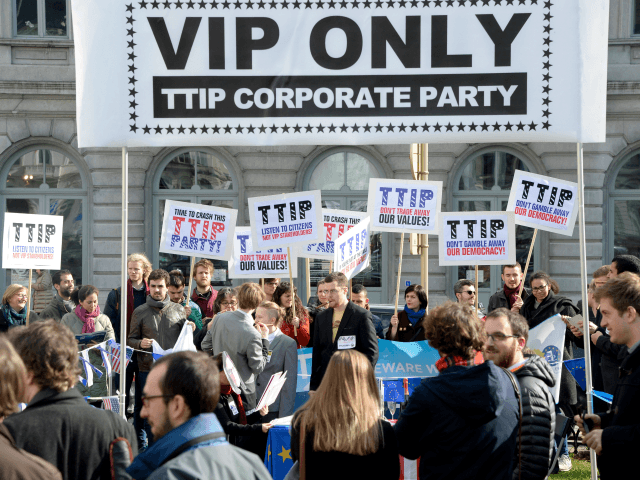 Activists demonstrate against the Transatlantic Trade and Investment Partnership between the EU and