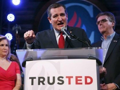 Republican presidential candidate, Sen. Ted Cruz (R-TX), with wife Heidi and Texas Attorney General Dan Patrick by his side, celebrates at a Super Tuesday watch party March 1, 2016.