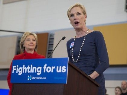 Planned Parenthood president Cecile Richards, right, applauds introduces Clinton during a campaign rally at Burford Garner Elementary School, on Sunday, Jan. 24, 2016, in North Liberty, Iowa. (AP Photo/Evan Vucci)