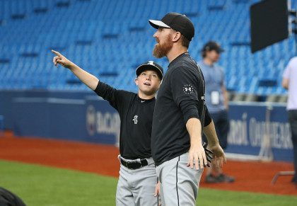 TORONTO, CANADA - MAY 25: Drake the son of Adam LaRoche #25 of the Chicago White Sox points to the roof as it opens during batting practice before the start of MLB game action against the Toronto Blue Jays on May 25, 2015 at Rogers Centre in Toronto, Ontario, Canada. …